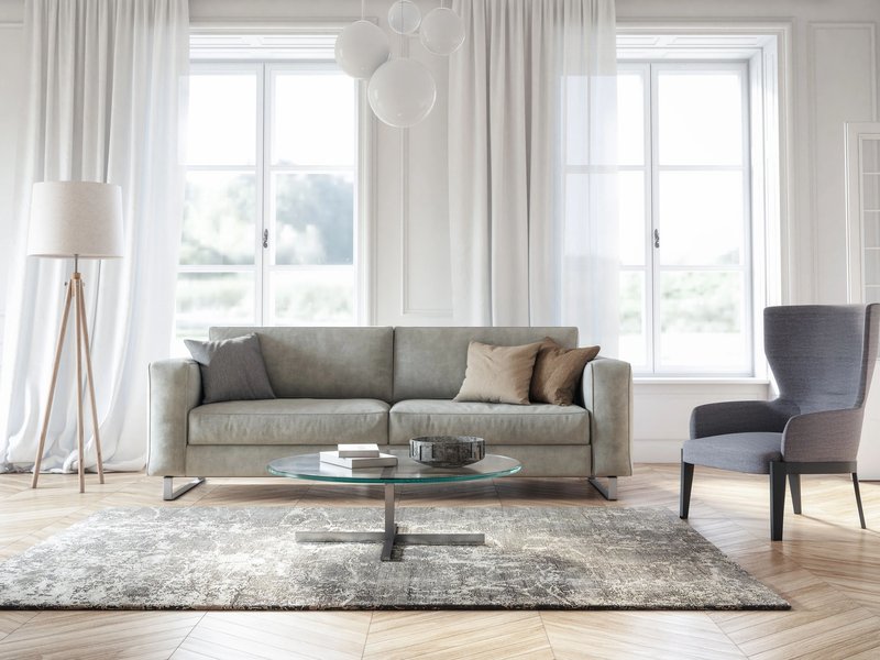 Couch and armchair on rug - Rick Lovelady Carpets Inc in Amarillo, TX